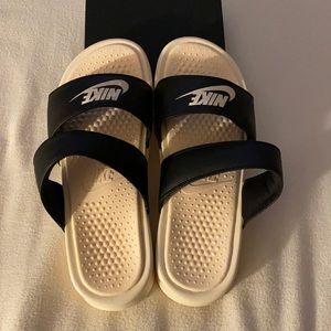New Nike women’s off court double strap slides, black stripes light peach button